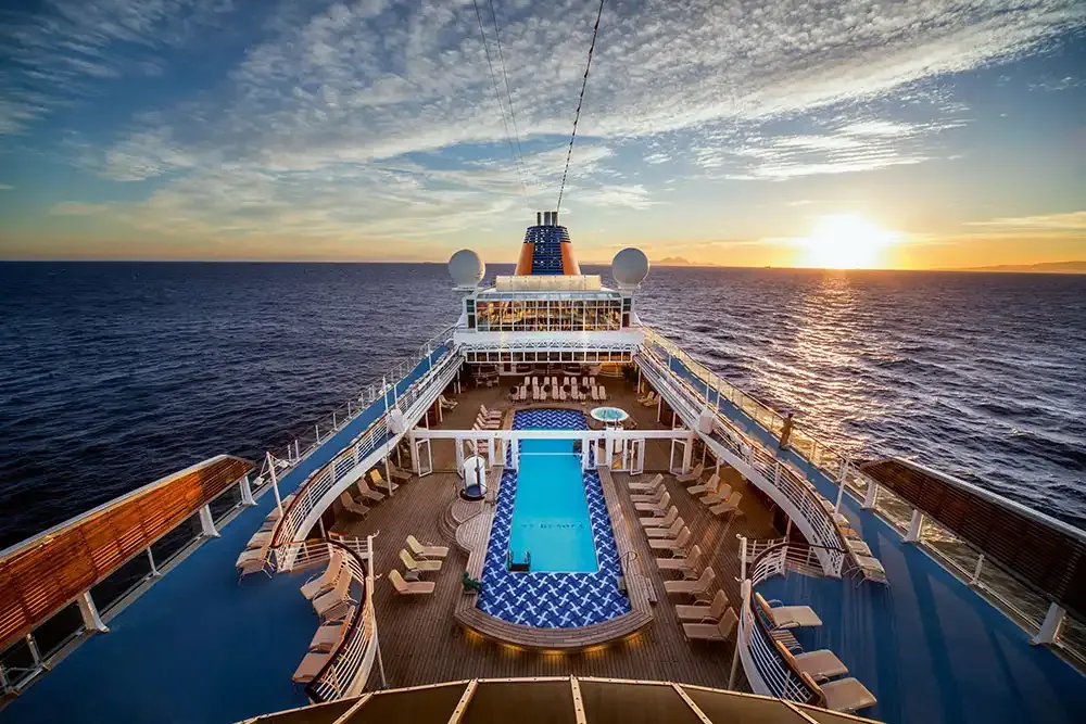 Pool deck of MS Europa at sunset