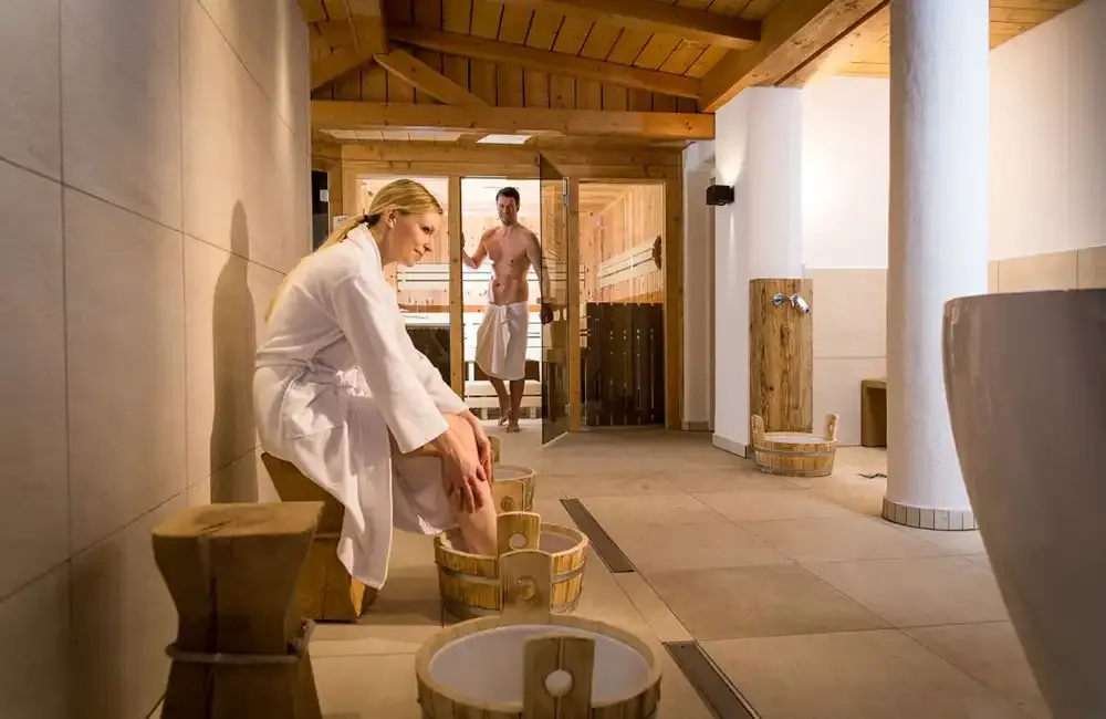 Couple relaxing in the spa at Der Löwe in Leogang