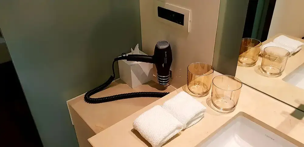 Washbasin with hairdryer at the SIDE Hotel Hamburg