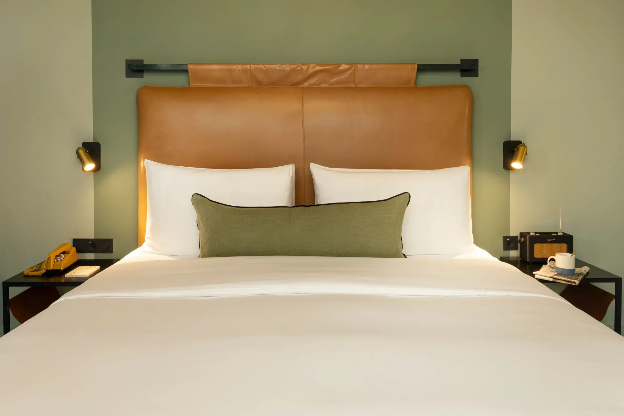 A Signature Room at The Hoxton, Amsterdam with a leather headboard