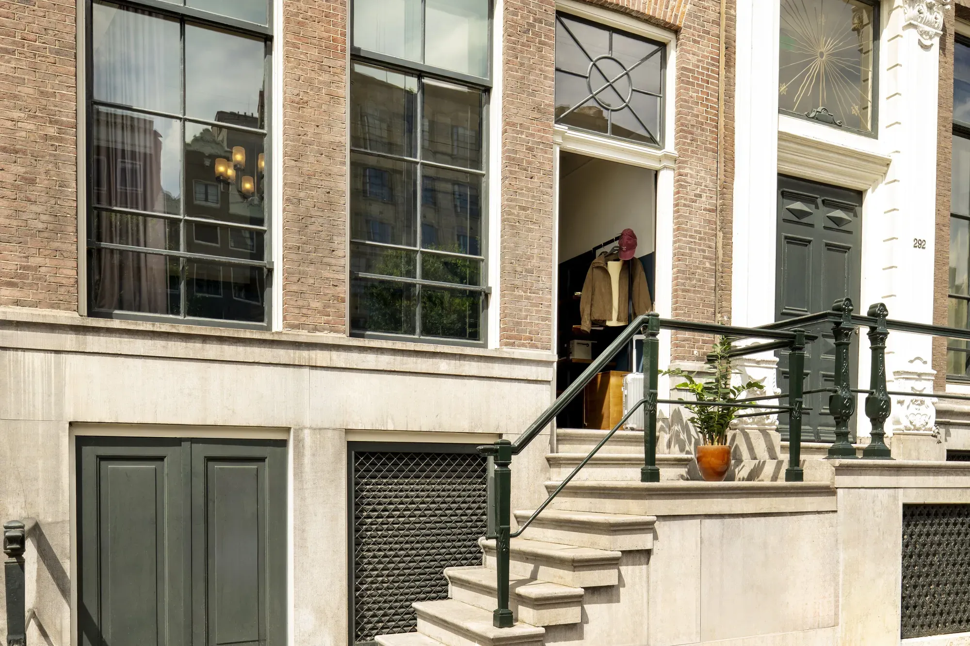 The canal house steps leading to a Signature Room with its own entrance at The Hoxton, Amsterdam