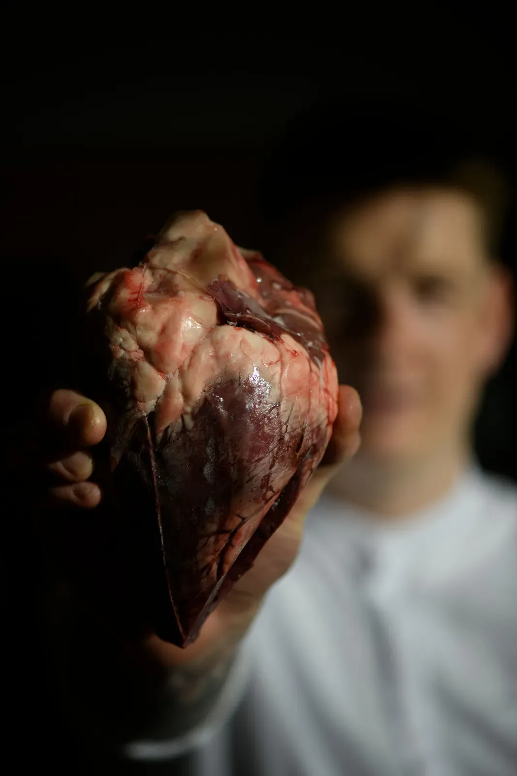 Clemens Gesser holding a whole lamb heart