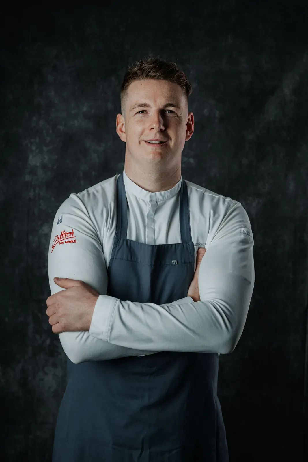 Clemens Gesser, Executive Chef of Chef's Table by Gesser, with his arms crossed