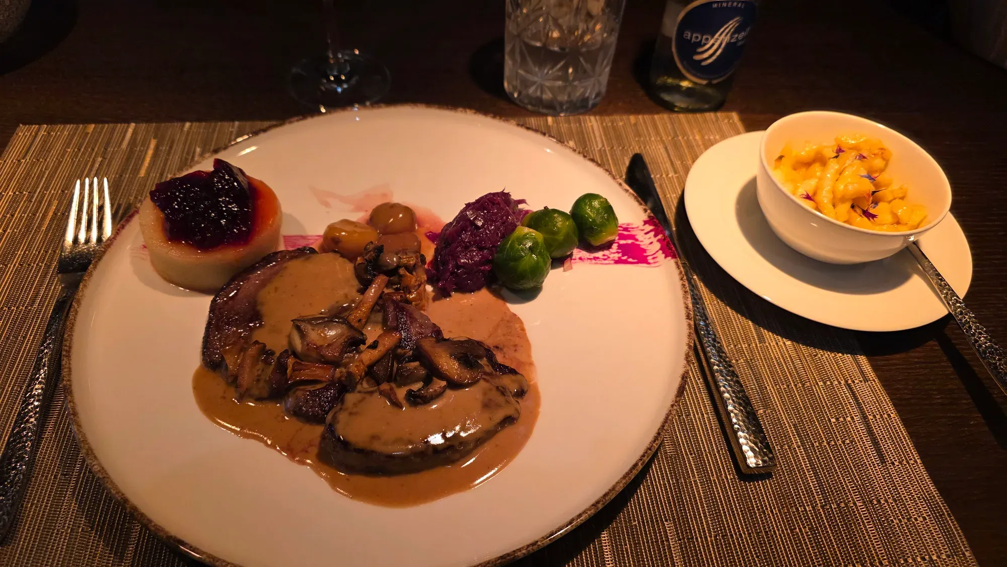 Venison schnitzel with game cream sauce, mushrooms and red cabbage, with Spätzli on the side, at Löwengarten Rorschach