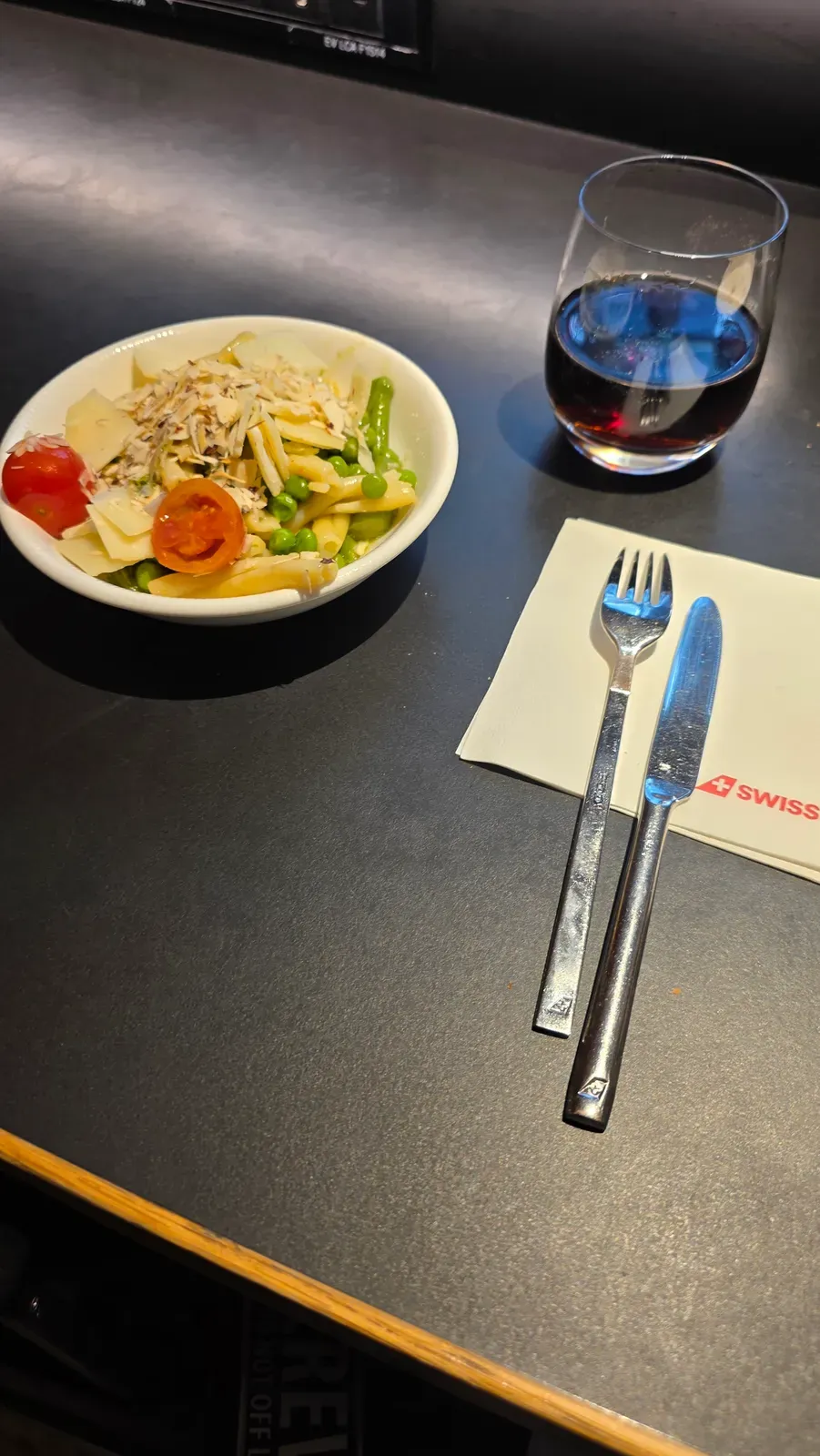 Pasta salad with peas, green beans, cherry tomatoes, Parmesan and almonds in the SWISS Business Lounge Zurich
