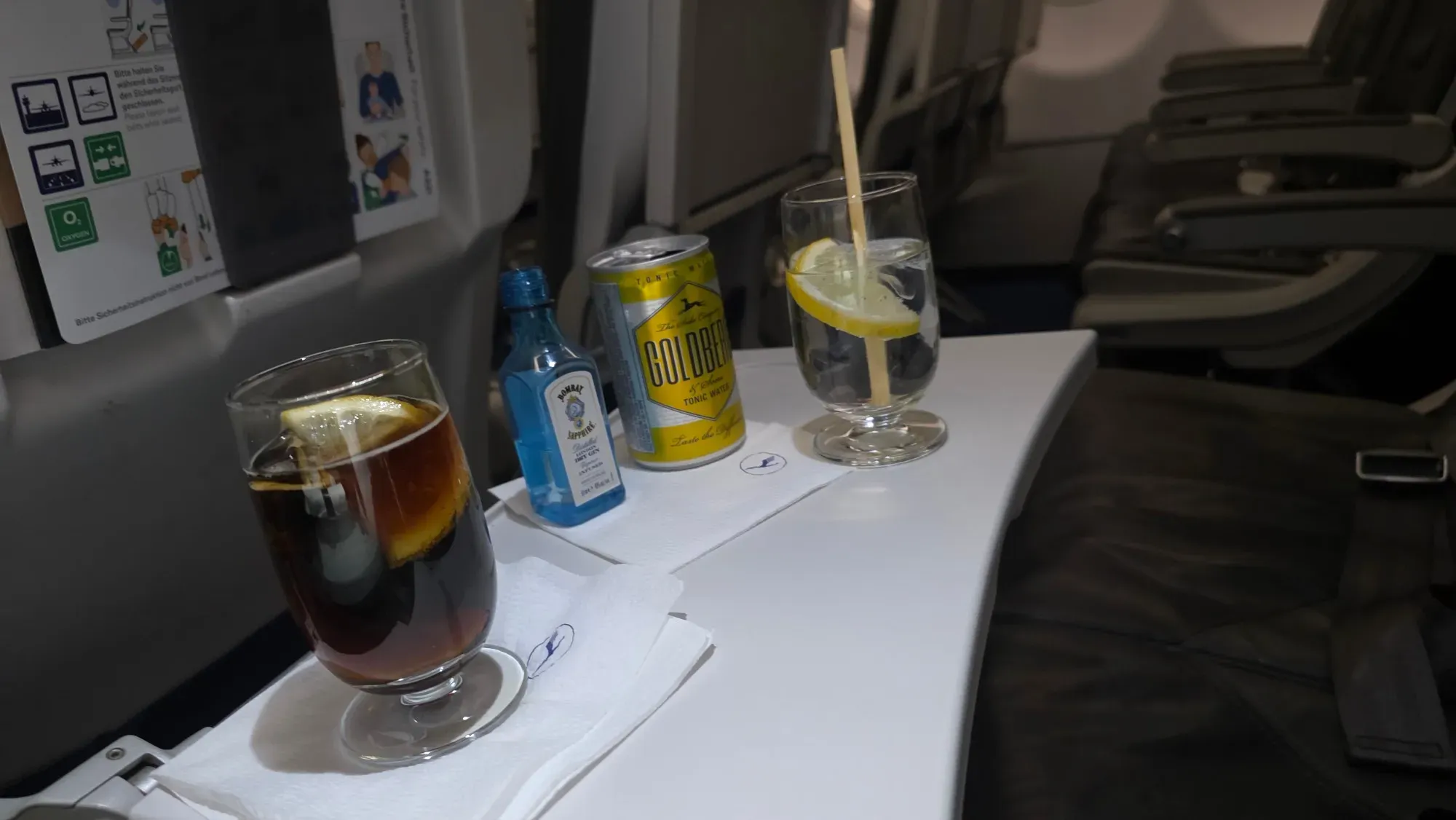 Drinks in Lufthansa Business Class: Bombay Sapphire gin with Goldberg tonic and a soft drink over ice with lemon