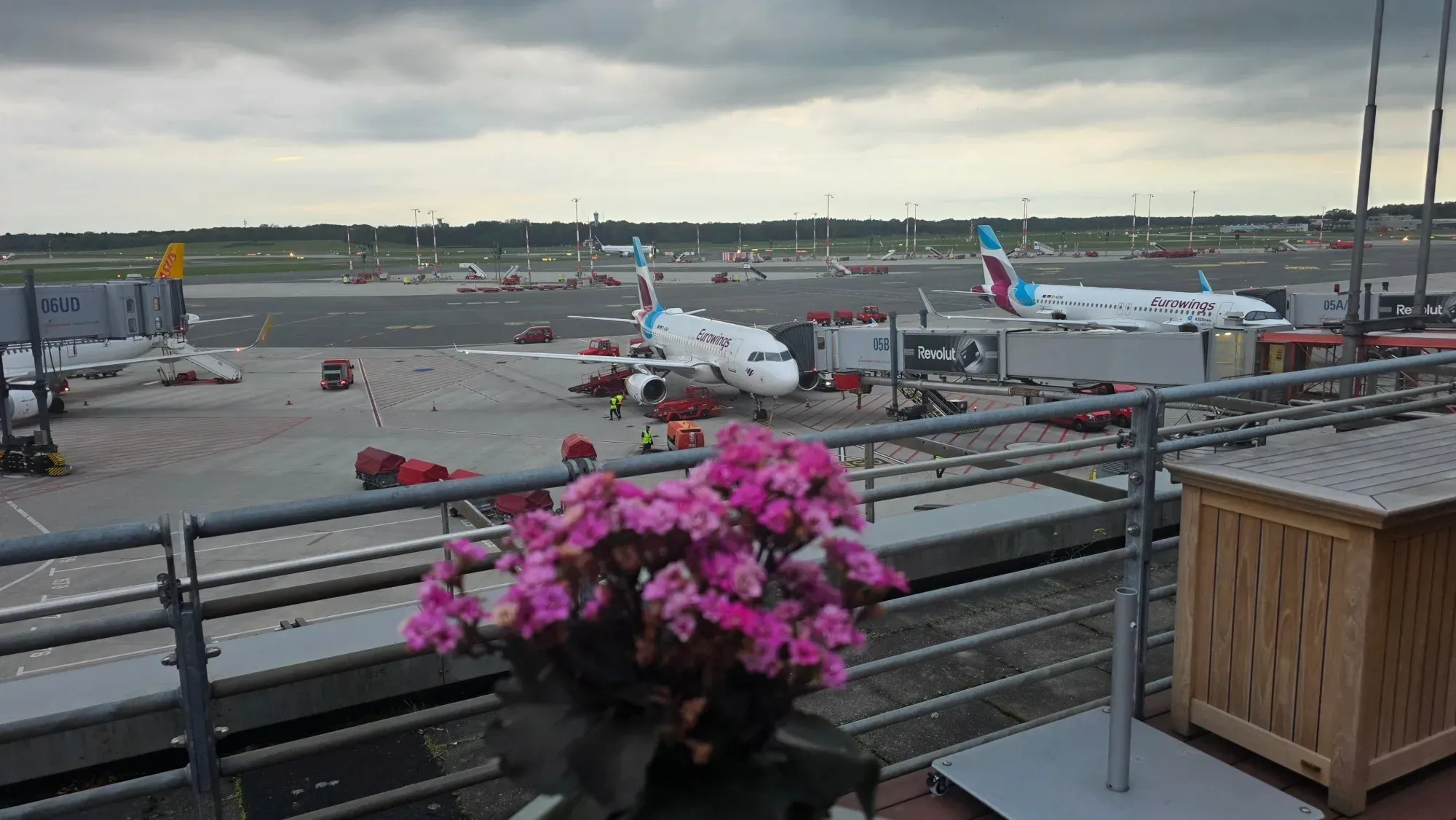 View from the terrace of the Lufthansa Senator Lounge over the apron of Hamburg Airport with two Eurowings aircraft
