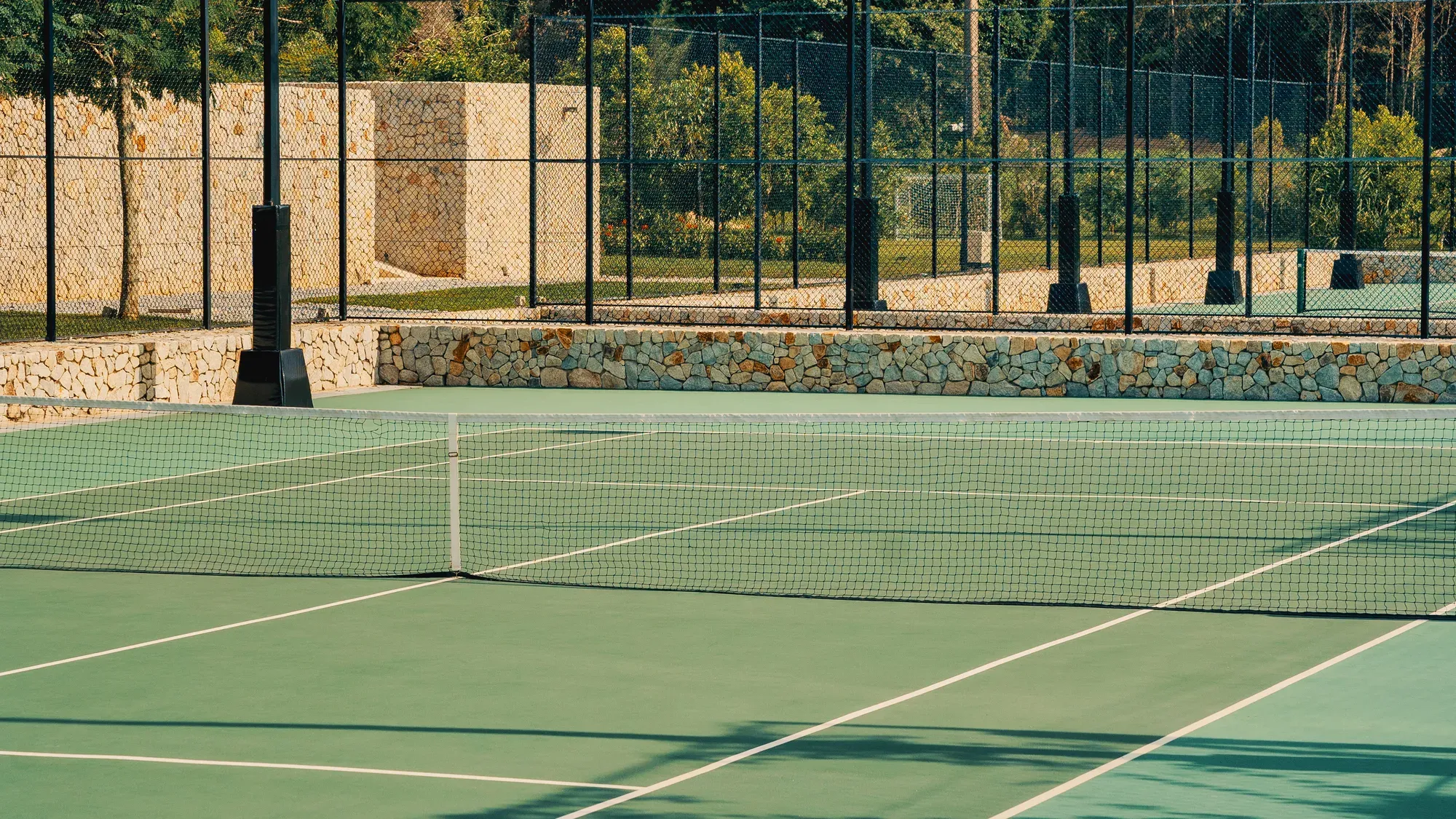 A tennis court in the rainforest at Mandarin Oriental, Desaru Coast