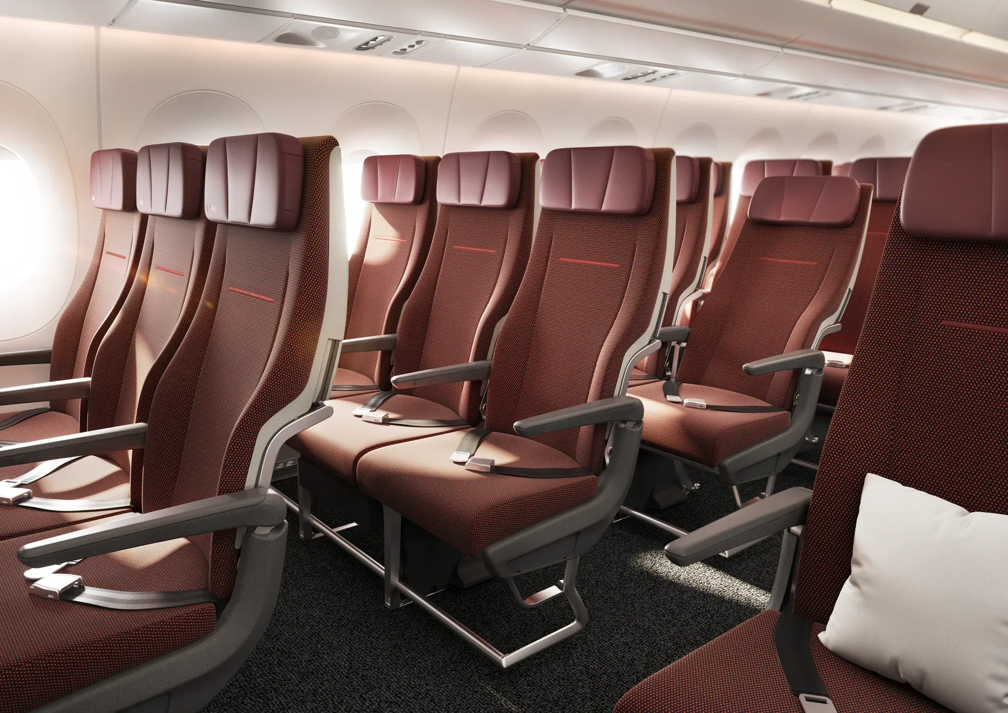 Economy seats with red woollen upholstery on the Qantas A350-1000ULR