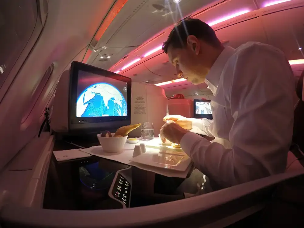Roger Hohl dining in Qatar Airways A380 Business Class