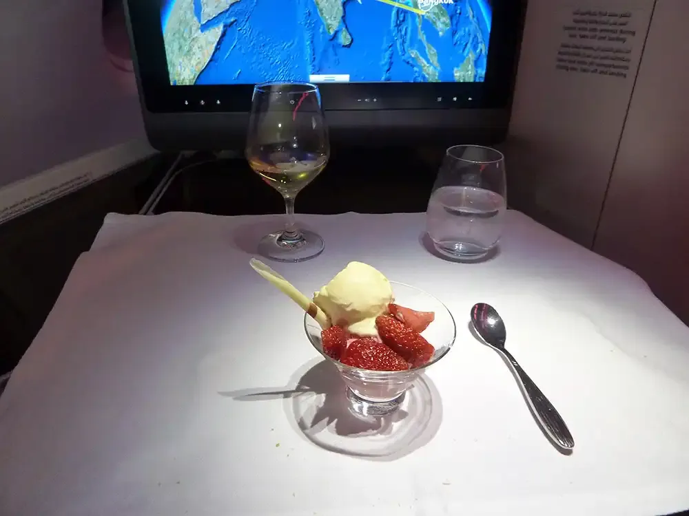 Ice cream with strawberries in Qatar Airways A380 Business Class