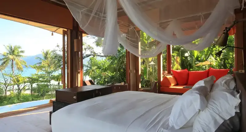 Bedroom of a hill villa at Soneva Kiri