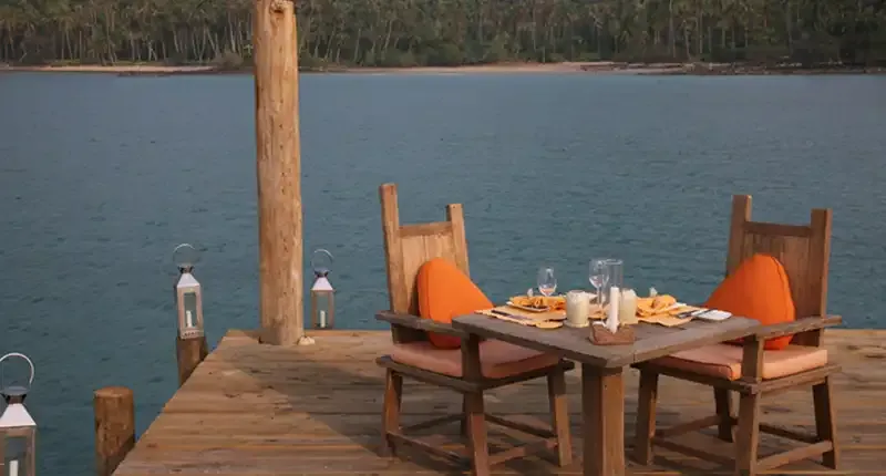 Table set for dinner on the jetty at Soneva Kiri