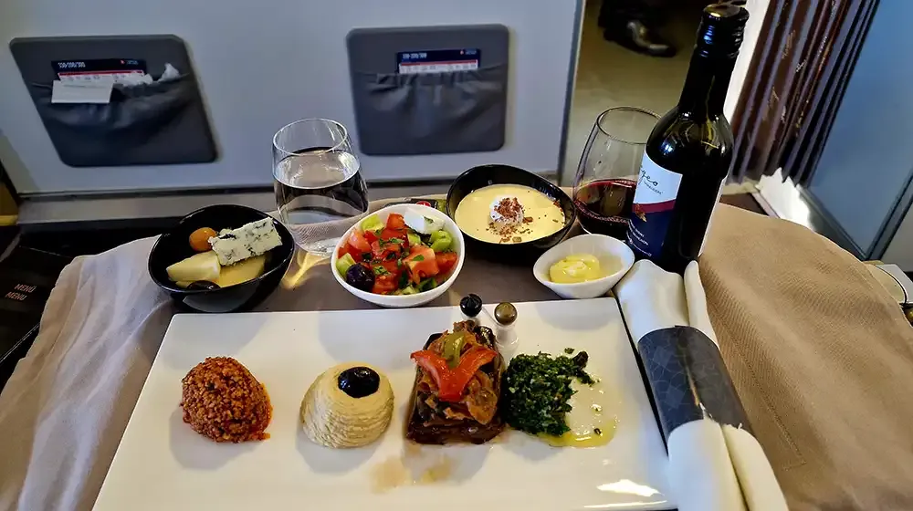 Turkish Airlines Business Class meal with starters and grilled lamb