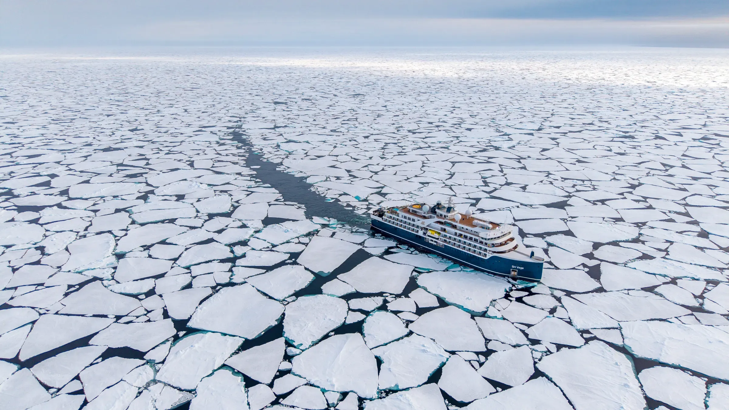 Swan Hellenic expedition ship SH Vega breaking through pack ice