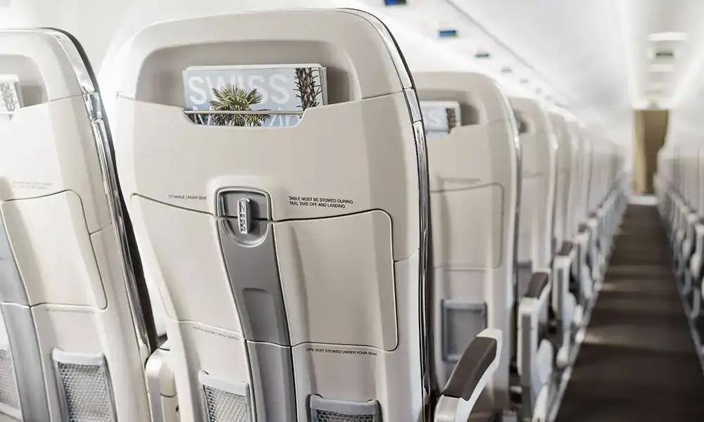 SWISS A220-300 seats and aisle seen from the front row