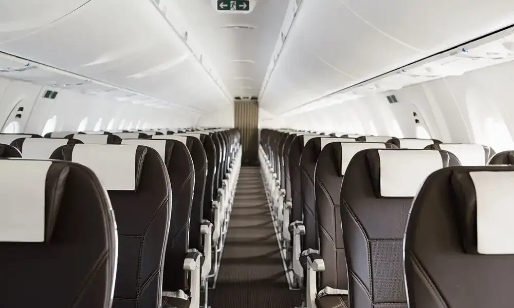 SWISS A220-300 cabin with leather seats, view down the aisle